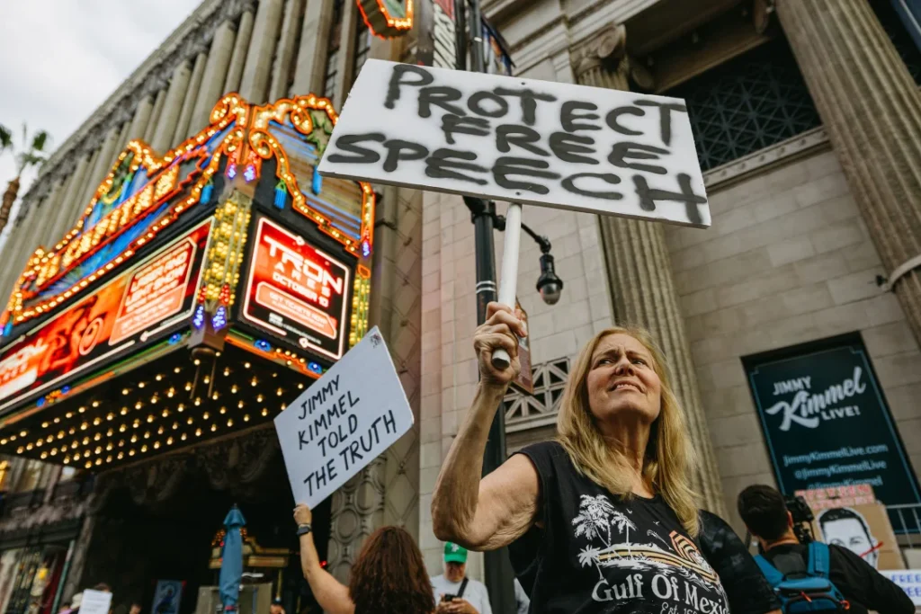 Woman holding a banner 