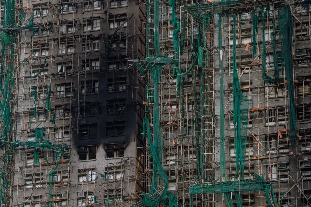 An aerial view of the burnt buildings after a deadly fire that started Wednesday at Wang Fuk Court, a residential estate in the Tai Po district of Hong Kong's New Territories