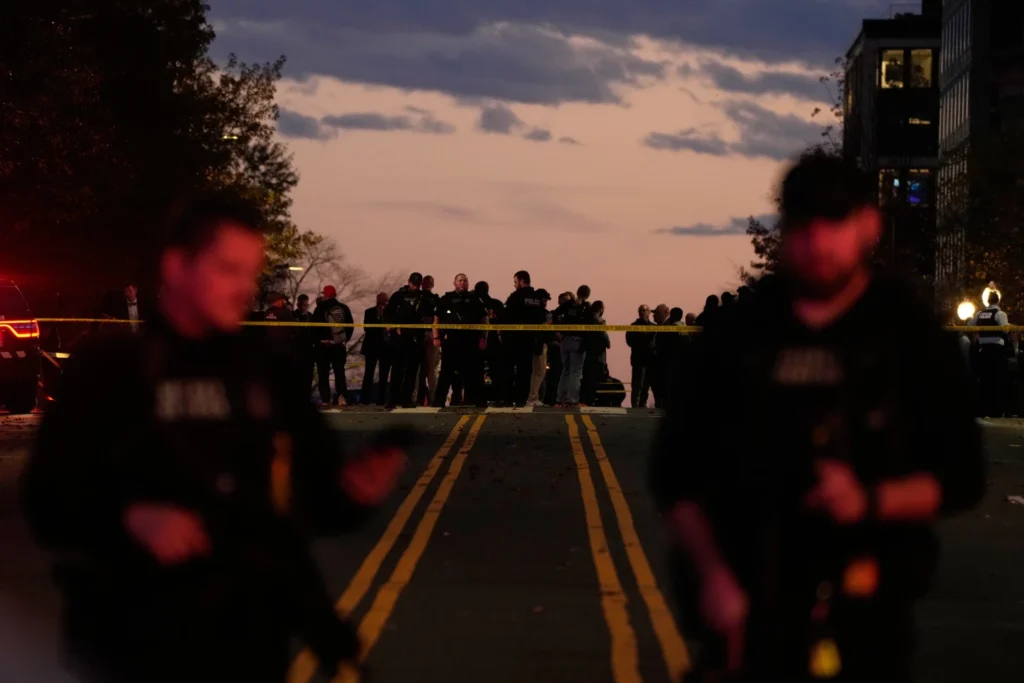 Emergency personnel keep a presence following the shooting of two National Guard soldiers near the White House, Wednesday, Nov. 26, 2025, in Washington