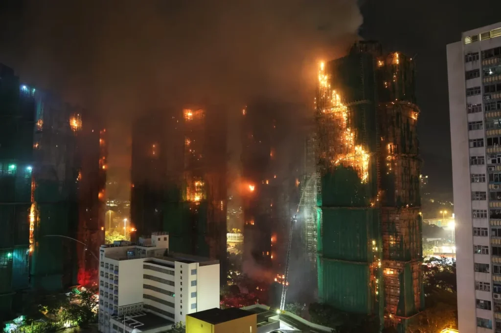 Firefighters work to extinguish flames at Wang Fuk Court housing estate in Hong Kong on Wednesday.