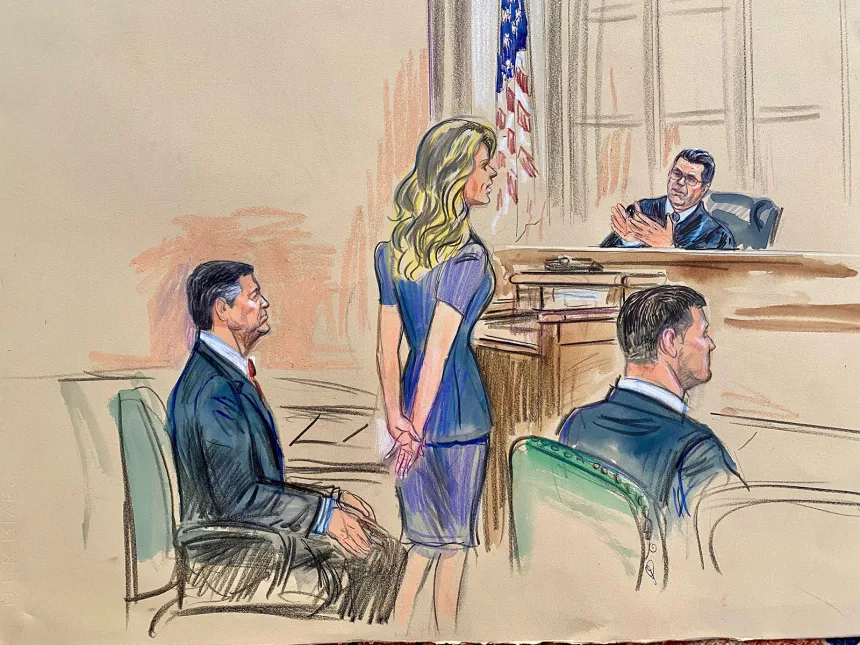 Interim US Attorney Lindsey Halligan speaks with the judge a hearing in the James Comey criminal case in Arlington, Virginia, on Wednesday, November 19, 2025