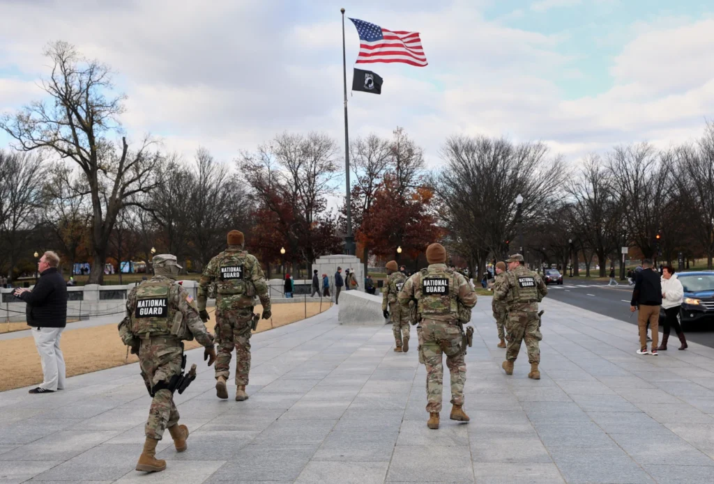 National Guardsmen patrol in front of the National Mall near the Lincoln Memorial