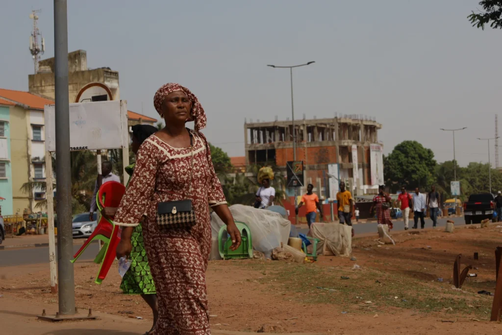 People walk on streets in Bissau, Guinea-Bissau