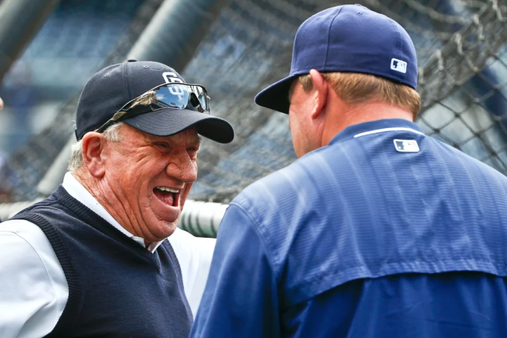Former San Diego Padres pitcher Randy Jones laughs while talking with manager Pat Murphy