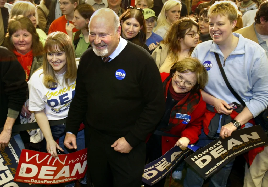Actor and director Rob Reiner, center, poses for photographs while stumping along with actor Martin Sheen, not seen at the University of Northern Iowa, in Cedar Falls, Iowa