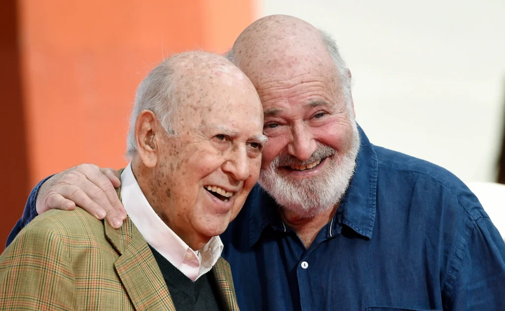 Carl Reiner, left, and his son Rob Reiner pose together following their hand and footprint ceremony at the TCL Chinese Theatre, April 7, 2017, in Los Angeles
