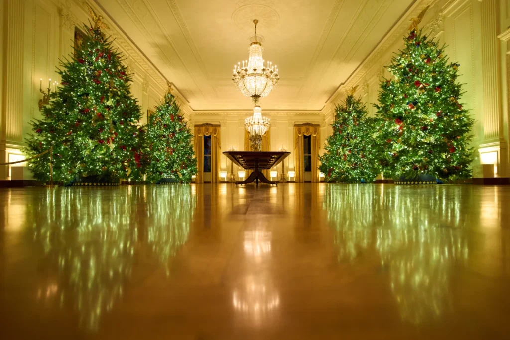 Christmas tress decorate the East Room of the White House during a press preview of the Christmas decorations "Home is Where the Heart Is", Monday, Dec. 1, 2025