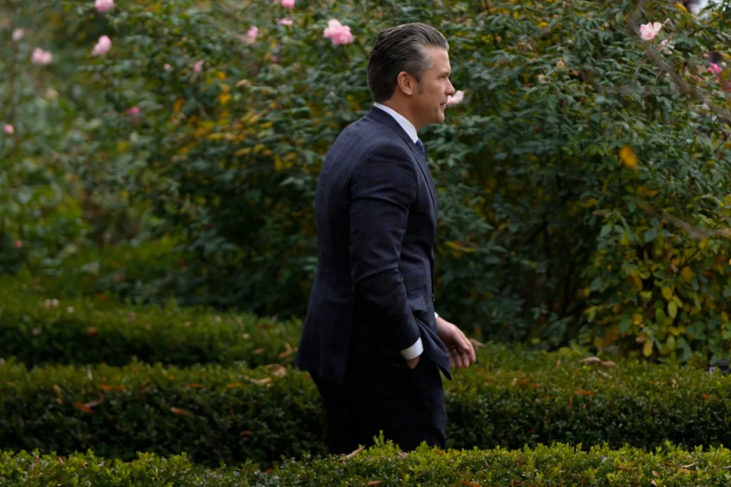 Defense Secretary Pete Hegseth arrives for the national Thanksgiving turkey pardoning ceremony in the Rose Garden of the White House, Tuesday, Nov. 25, 2025, in Washington