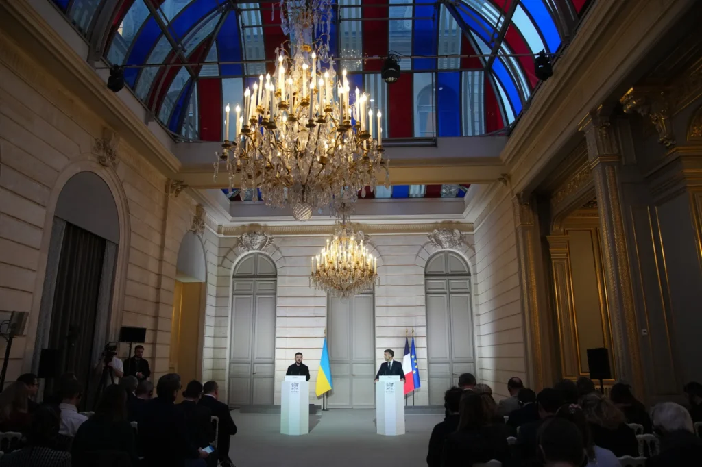 French President Emmanuel Macron, right, and Ukrainian President Volodymyr Zelenskyy give a joint press conference at the Elysee Palace in Paris, Monday, Dec 1, 2025.